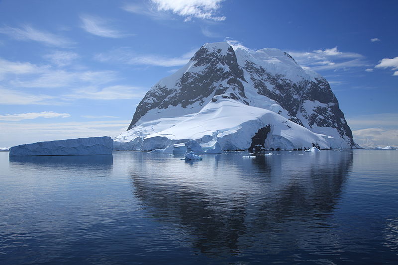 File:Icebergs and Booth Island, Antarctica (6062693592).jpg