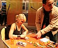 Signing autographs in Frankfurt, Germany in April 2006