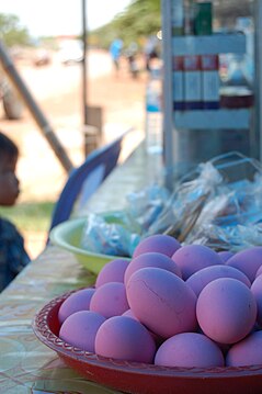 Pink century eggs in Laos