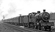 A train ascending the Lickey Incline, assisted in rear by a banking engine Lickey Bank geograph-2611010-by-Ben-Brooksbank.jpg