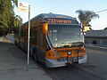 LACMTA bus with an orange Luminator Spectrum text formatting