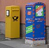 Letter boxes in Münnerstadt. Left is the yellow Deutsche Post noxy; the other one is a local service.