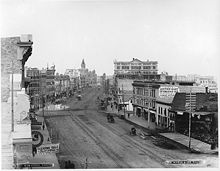 A commercial boom in the early-1880s resulted in the expansion of commercial uses in the centre of the city near Main Street. Main Street, Winnipeg, MB, 1887.jpg