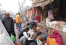 Les gens de Mallah dans un marché aux poissons.jpg