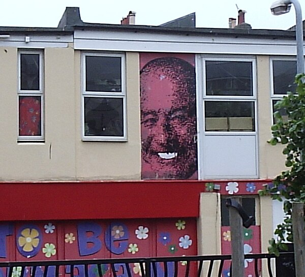 Mike Reid's face on the façade of a shop in Brighton