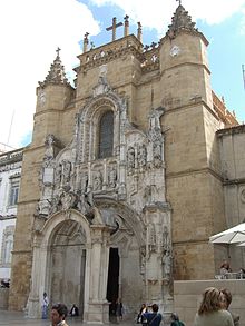 Monastery of Santa Cruz (Coimbra), its original Romanesque facade was later redecorated with Manueline style during the 16th century Mosteiro de Santa Cruz, fachada.jpg