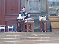 The Mugenkyo Taiko drummers performing on the museum steps
