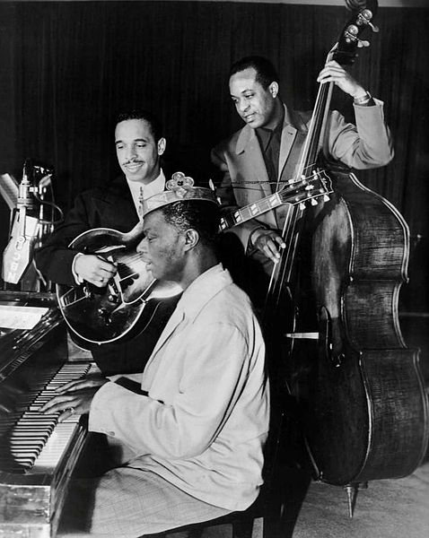 King Cole Trio Time on NBC with Cole on piano, Oscar Moore on guitar, and Johnny Miller on double bass, 1947