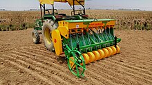 A National Agro Happy Seeder at work in the field after paddy harvest National Agro Happy Seeder.jpg