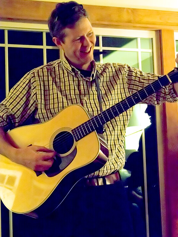 Robbie Fulks playing a house concert on December 14, 2013