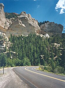 White cliffs and forest on the way up Parowan Canyon Ruggedwhitecliffs original.jpg