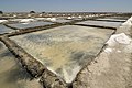 * Nomination Marakkanam in Tamil Nadu, India has many salt pans where they produce sea salt by drying up sea water that is pumped into pans. The photograph depicts some typical salt pans. --Dey.sandip 08:27, 10 November 2012 (UTC) * Promotion QI for me. --JLPC 08:46, 10 November 2012 (UTC)