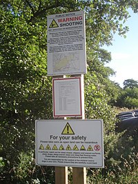 A shooting range warning sign in the UK (boundary=hazard + hazard=shooting_range)