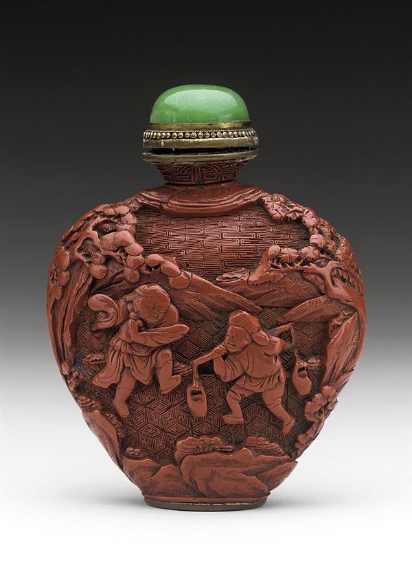 Chinese snuff bottle made of carved lacquer and jade, c. 18th century