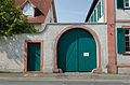 Courtyard gate and outbuildings