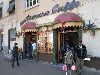 The "Asmara Caffe" on Harnet Avenue of Asmara is famous for Italian-style cappuccino and pastries. It has the italian word "caffe", that means 'coffee' Sweet Asmara Caffe (8351473807).jpg