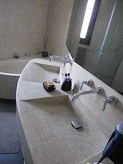 Modern bath, sinks, and walls made of tadelakt