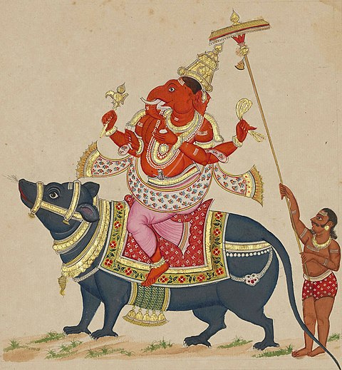 Sebuah lukisan bergaya Tajore, menampilkan Ganesa yang sedang mengendarai wahananya, yaitu tikus. Di belakangnya tampak seorang pelayan yang setia menemaninya.