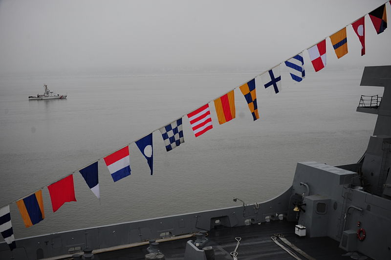File:The cutter USCGC Mustang (WPB 1310), above left, patrols during the commissioning ceremony of the amphibious transport dock ship USS Anchorage (LPD 23) in Anchorage, Alaska, May 4, 2013 130504-G-QL499-121.jpg