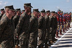 Personnel of the United States Marine Corps stand in formation next to the Military Band of the General Staff during the opening ceremony for Khaan Quest 2012.