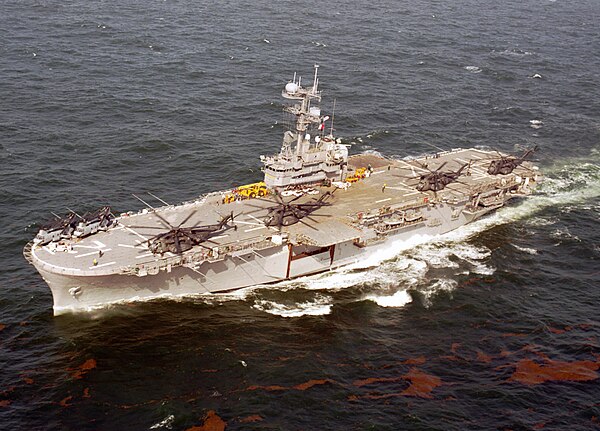 USS Inchon (MCS-12) with MH-53E minesweeping helicopters, 2001