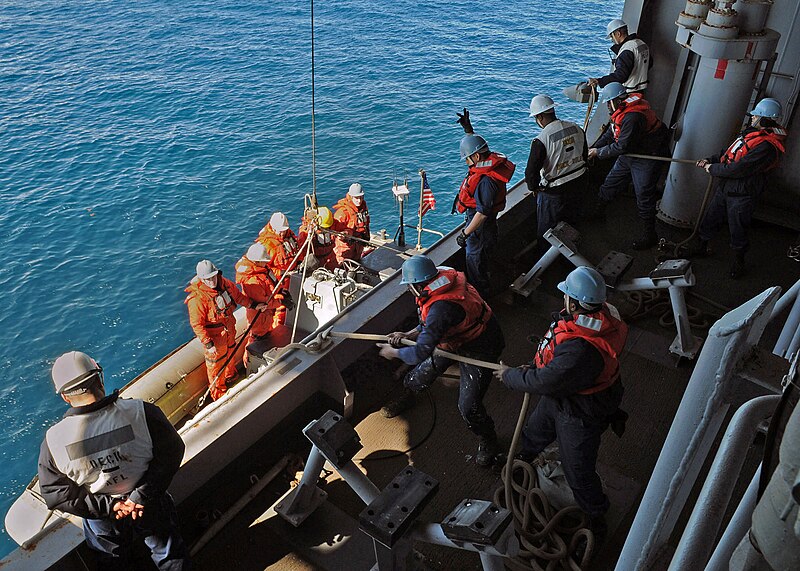 File:US Navy 120213-N-ZZ999-031 Boatswain's mates aboard the multipurpose amphibious assault ship USS Iwo Jima (LHD 7) hoist a rigid hull inflatable boa.jpg