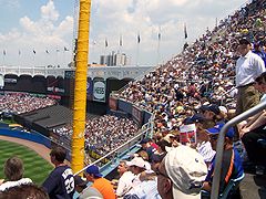 The foul pole, upper deck, and the bleachers