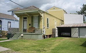 A classic camelback shotgun house in Uptown New Orleans