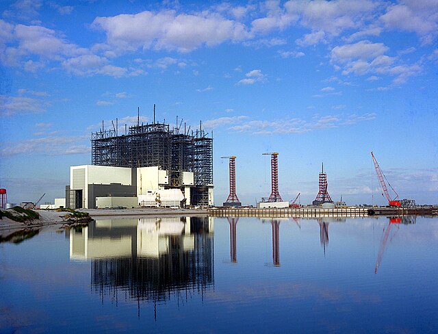 VAB during construction (1965) with the three Mobile Launchers for the Saturn V rocket.