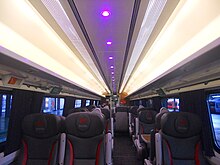 The interior of First Class aboard a Virgin Trains East Coast refurbished Mark 4 FO vehicle VTEC Refurbished Mark 4 First Class Interior 1.jpg