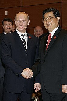 Jintao in a meeting with Russian President Vladimir Putin, 18 November 2006. Vladimir Putin at APEC Summit in Vietnam 18-19 November 2006-4.jpg