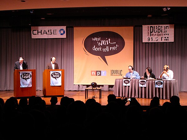 A recording of radio panel show Wait Wait... Don't Tell Me!, featuring, from left, announcer and scorekeeper Carl Kasell; host Peter Sagal; and paneli