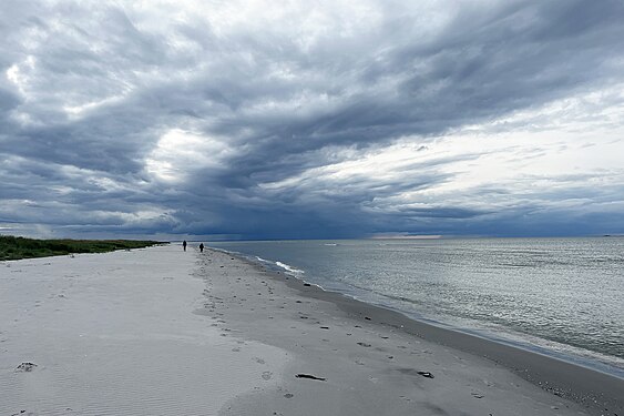 Walking along Storedal beach, Laesoe island