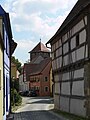 Deutschordensstraße, Blick zum Turm des Unteren Tors, rechts die 1492 errichtete Pristner-Scheune