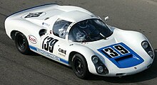 Howard Cherry driving the 1966 Porsche 910 at the 2004 Watkins Glen SVRA 1967 Porsche 910 (cropped).jpg