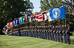 A color guard detachment from the 3rd U.S. Infantry Regiment in full dress. Color guards of the U.S. Armed Forces typically wear full-dress, or less formal attire. 2009 Non-commissioned Officer Parade DVIDS173390.jpg
