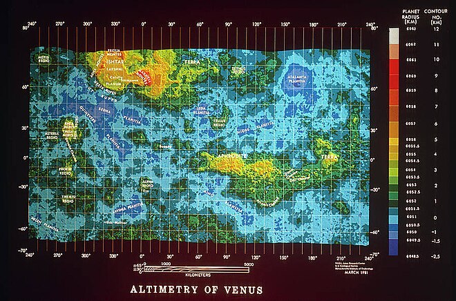 Color-coded elevation map, showing the elevated terrae "continents" in yellow and minor features of Venus.