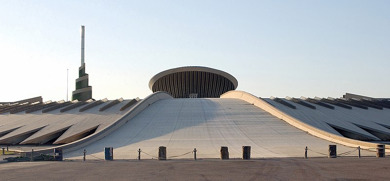 File:A glass spire adorns the top of the Iraqi Monument to the Unknown Soldier in Ceremony Square, Baghdad Iraq. The monument said to be inspired by the glorification of a martyr from th - DPLA - 6fa00d49b69b63b8419dd7df569b3d62.jpeg