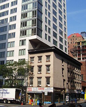 An example of air rights being disregarded: a high-rise building extends over a four-story building in New York City. Air rights 318 Third Ave.jpg