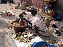 A peanut seller in Joal-Fadiouth, Senegal ArachidesSenegal.jpg