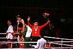 Thumbnail for File:Army SPECIALIST Fourth Class Aristedes Gonzalez, in red, representing Puerto Rico, after being presented with a bronze medal in the boxing competition at the 1984 Summer Olympics. O - DPLA - d16c4cfbf9fefb437b3a9bd4754ae634.jpg
