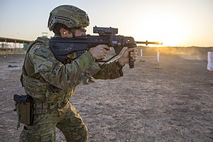 Australian soldier firing an EF88 assault rifle in 2018.jpg