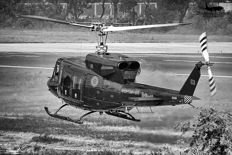 File:BH134 A Bangladesh Air Force Bell 212 dusting off to join the 16th Dec flypast. (23263168264).jpg