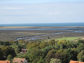 View of the Glaven's present course through the salt marshes, with the old channel and the shingle spit in the distance Blakeney Channel viewed from the top of St Nicholas Church - geograph.org.uk - 1516479.jpg
