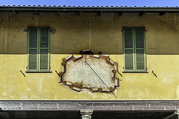 Ancient Sundial at four sided portico of Collegiata Church (Arona, Maggiore Lake, Italy)