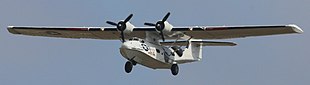 A maritime patrol Catalina, painted as bright as possible--white--to minimise visibility against the sky, still mainly appears dark. Yehudi lights match brightness better by generating light. Consolidated PBY-5A Catalina (cropped).jpg