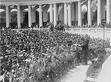 Coolidge addressing a crowd at Arlington National Cemetery's Roman-style Memorial Amphitheater in 1924