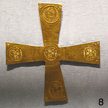 A different, and far humbler, small cross of gold foil, with rubbings of coins of Justin II and holes for nails or thread, Italian, 6th century Crocetta d'oro longobarda con moneta di giustino II, da novara, VI-VIII sec..JPG