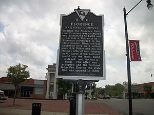 Historic marker for the Florence Railroad at Dillon (Amtrak station). Dillon Station Plaque; West Side.JPG