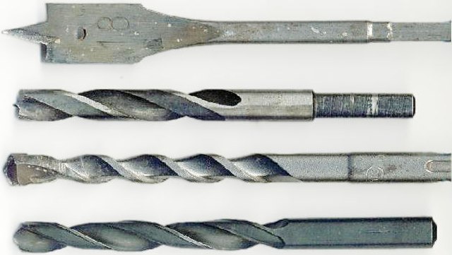 From top: Spade, brad point, masonry, and twist drills bits